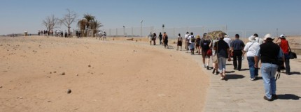 The tourists trek through the desert to Abu Simbal